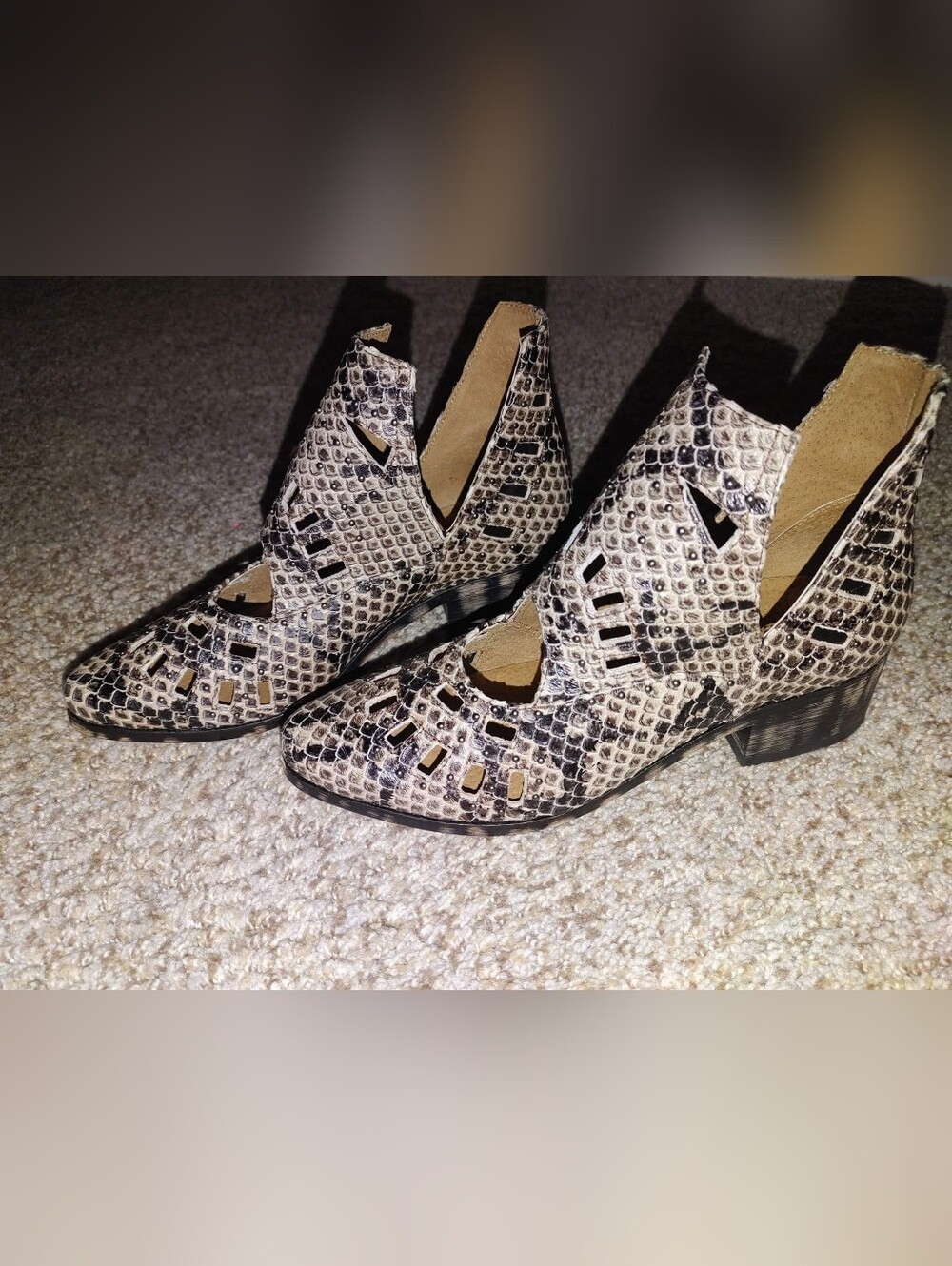 Women’s Snake-Print Cutout Ankle Heels in Black and Cream